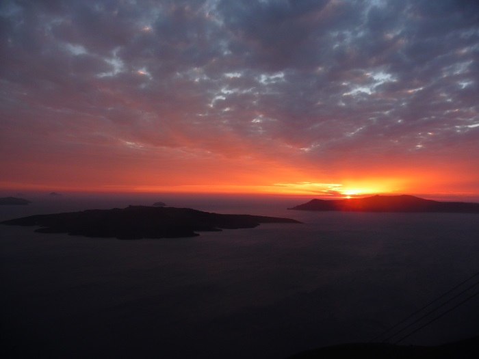 Dramatic sunset over the Santorini caldera